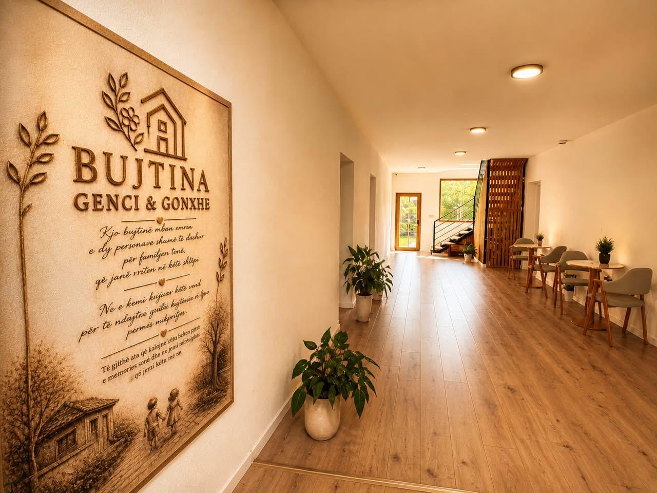 Hallway with the Bujtina Genci & Gonxhe family plaque